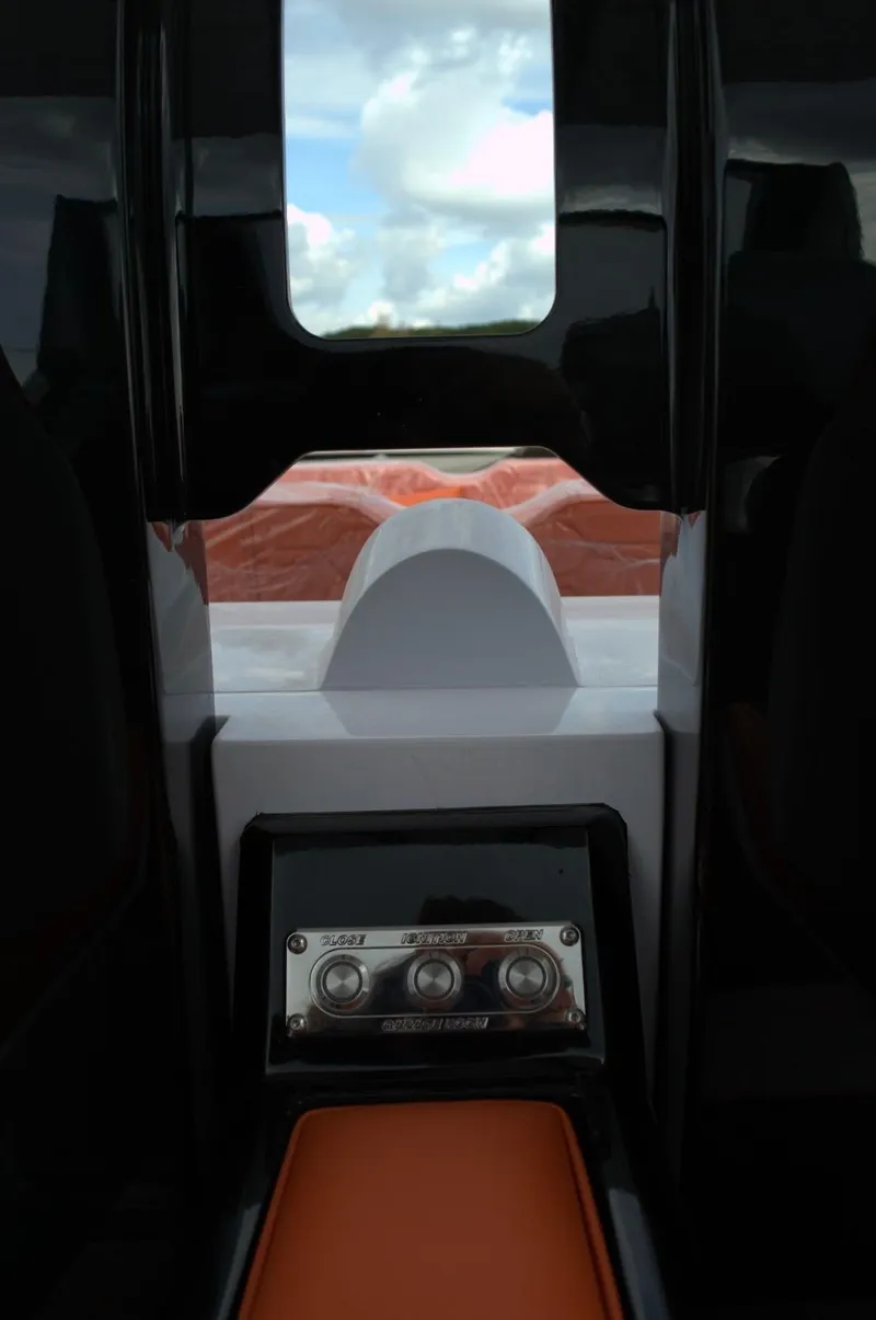 Slide: The Image of Interior view of DNA 46 model, 2025, featuring sleek design and control panel. - 15