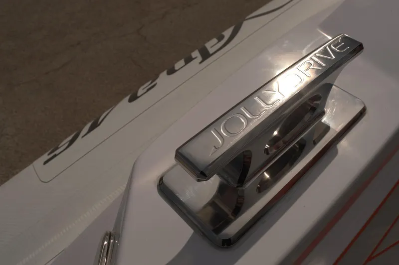 Slide: The Image of Close-up of a 2025 DNA 46 boat with "Jolly Drive" branding. - 19