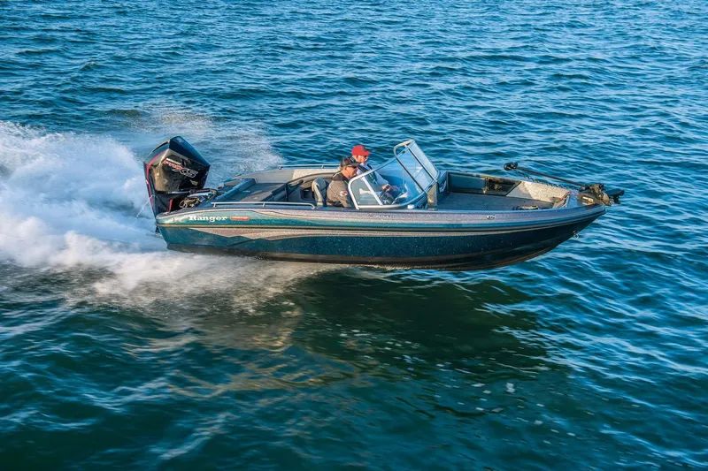 Slide: The Image of 2025 Ranger 1880MS boat speeding on open water. - 13