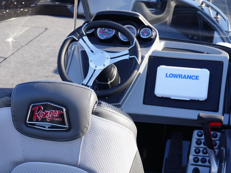 Slide: The Image of Interior of 2025 Ranger 1880MS boat with steering wheel and Lowrance display. - 5