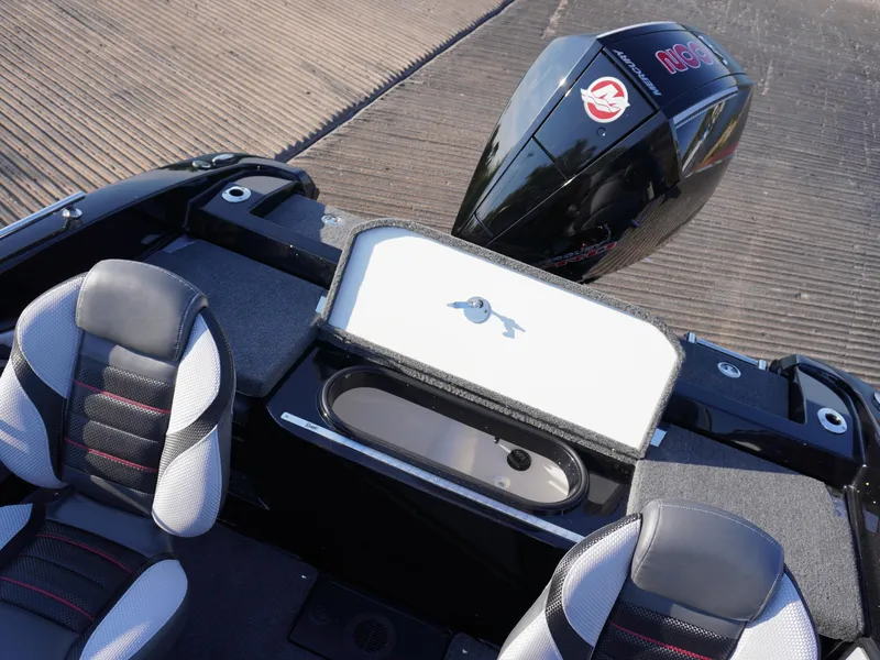 Slide: The Image of 2025 Ranger 1880MS boat interior with seating and storage compartment. - 8