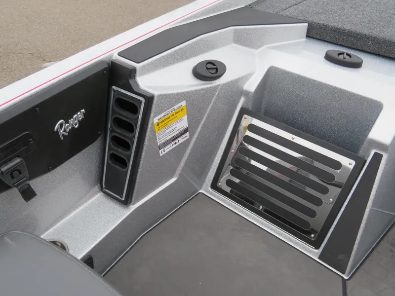 Slide: The Image of 2025 Ranger Z519R Cup-Equipped boat interior with storage compartments and sleek design. - 11