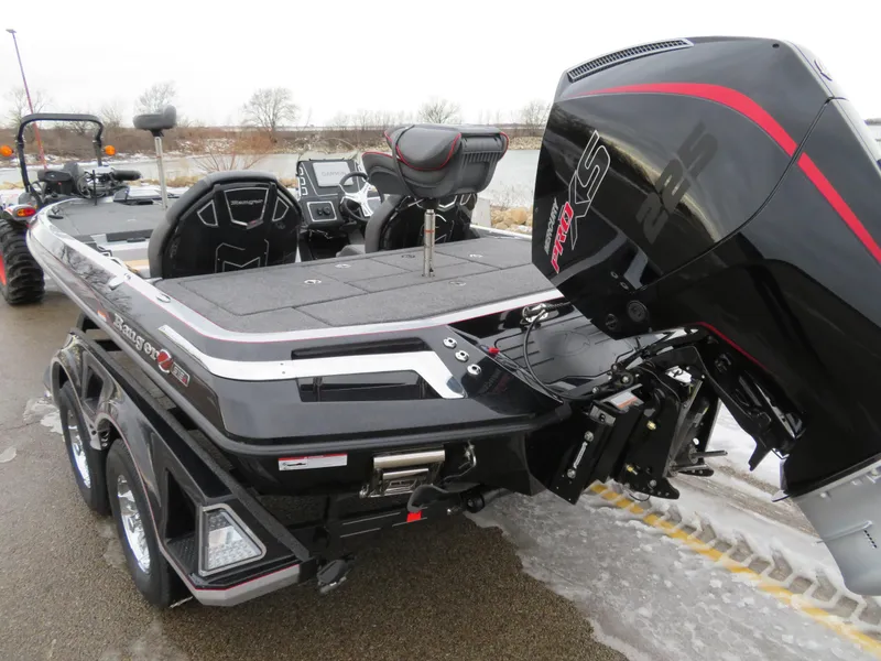 Slide: The Image of 2025 Ranger Z519R Cup-Equipped boat with powerful engine, sleek design, and dual axles. - 3