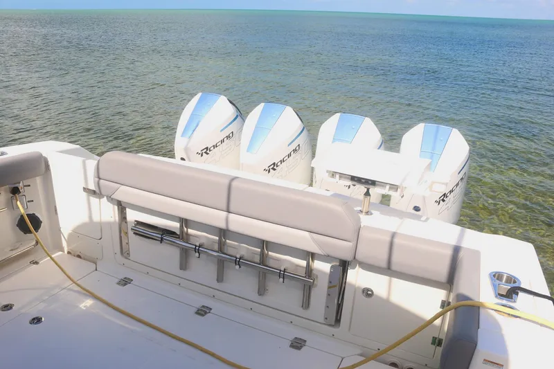 Slide: The Image of Boston Whaler 380 Outrage 2022 with powerful outboard engines on calm sea. - 21