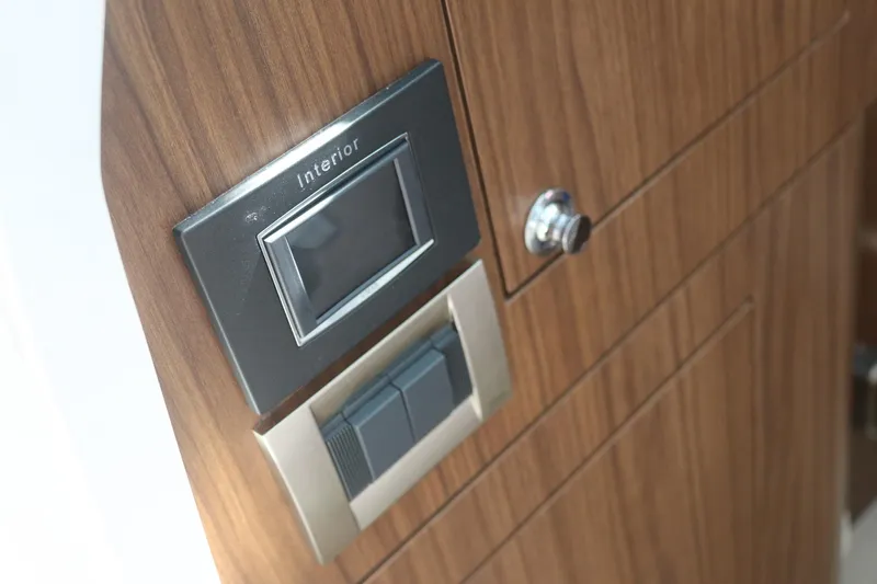 Slide: The Image of Interior control panel on 2022 Boston Whaler 380 Outrage boat. - 9