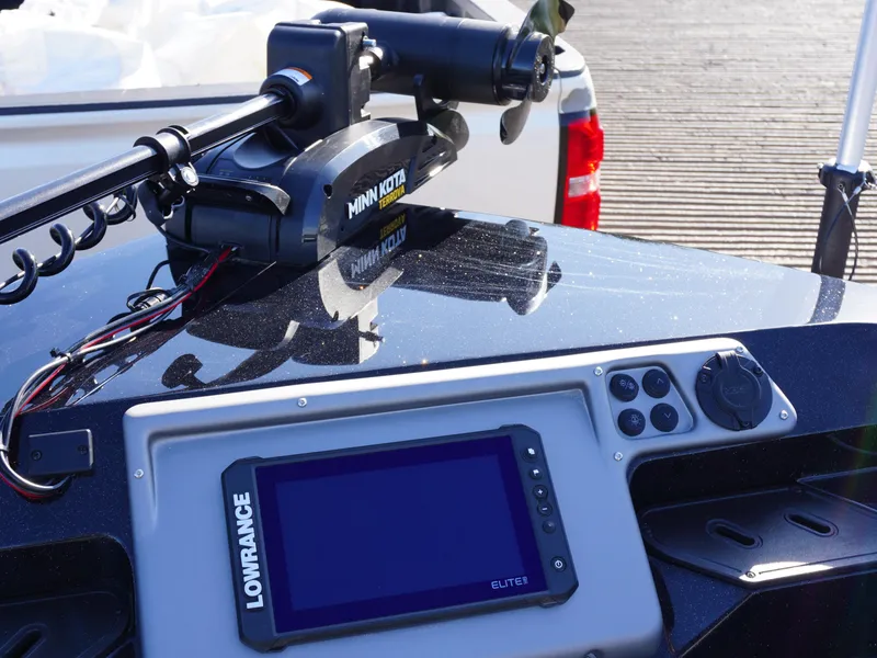 Slide: The Image of Control panel of 2025 Ranger 2080MS boat with Lowrance Elite display and Minn Kota motor. - 16