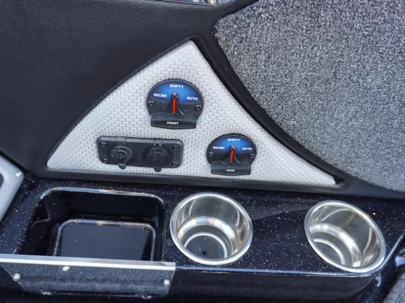 Slide: The Image of Control panel of 2025 Ranger 2080MS boat with cup holders and switches. - 19