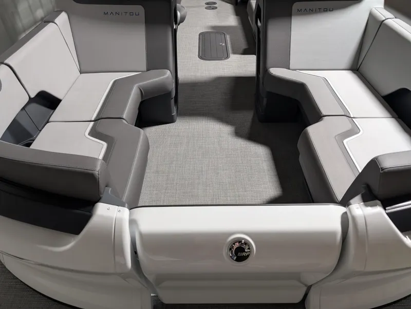 Slide: The Image of 2025 Manitou 22 CRUISE interior with modern seating and sleek design. - 12