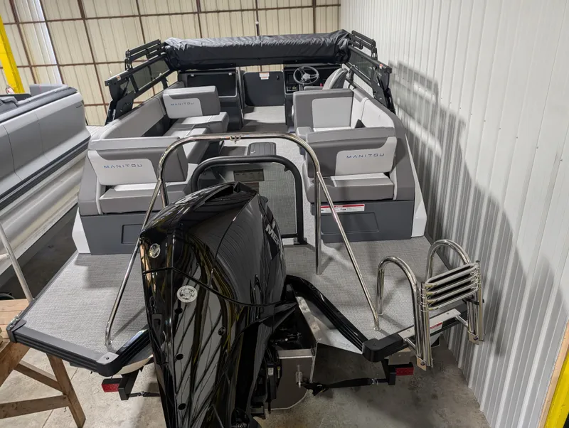 Slide: The Image of 2025 Manitou 22 CRUISE pontoon boat with spacious seating and modern design. - 4