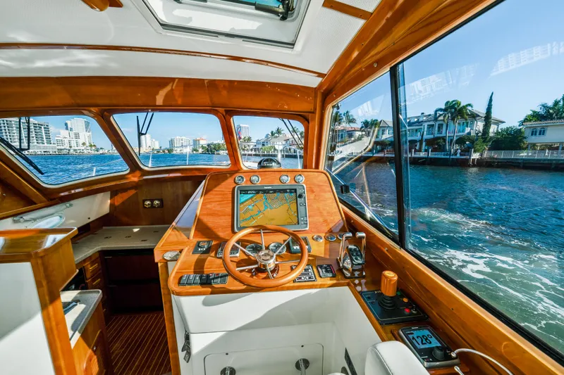 Slide: The Image of Interior view of 2008 Hinckley Talaria 44 yacht cockpit with navigation system. - 5
