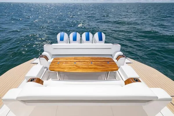 Slide: The Image of 2025 Tiara Yachts 56 LS luxury yacht with elegant seating and ocean view. - 16