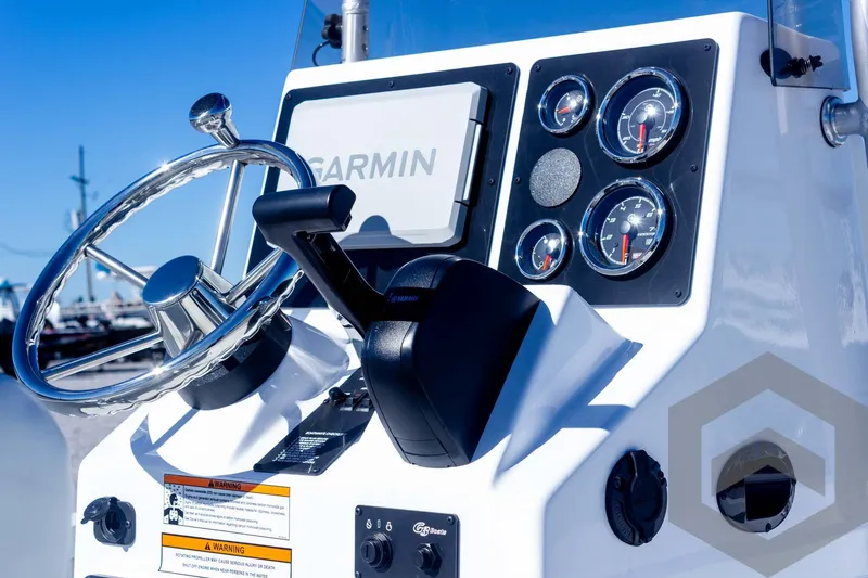 Slide: The Image of Control panel of 2025 G3 Bay 19 GX boat with Garmin navigation system. - 13