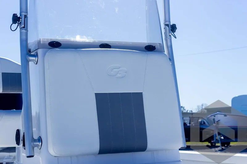 Slide: The Image of 2025 G3 Bay 19 GX boat seat with logo, outdoor setting. - 16