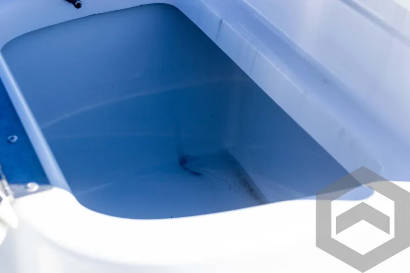 Slide: The Image of 2025 G3 Bay 19 GX boat interior, featuring a spacious storage compartment. - 21