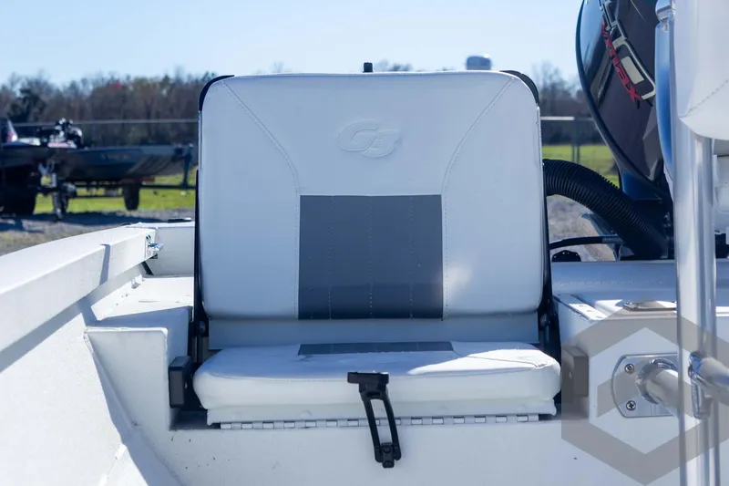 Slide: The Image of 2025 G3 Bay 19 GX boat seat, white upholstery, outdoor setting. - 27