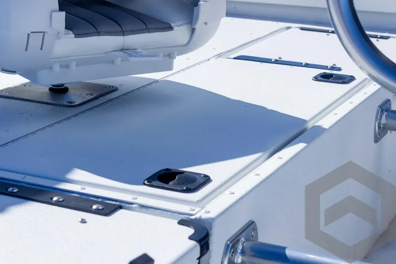 Slide: The Image of 2025 G3 Bay 19 GX boat deck with seating and storage compartments. - 28