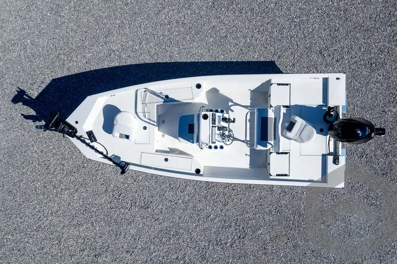 Slide: The Image of 2025 G3 Bay 19 GX boat, aerial view, white deck, modern design. - 32