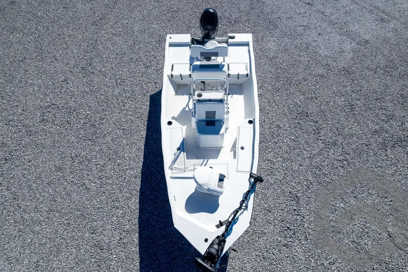Slide: The Image of 2025 G3 Bay 19 GX boat on gravel surface, aerial view. - 33