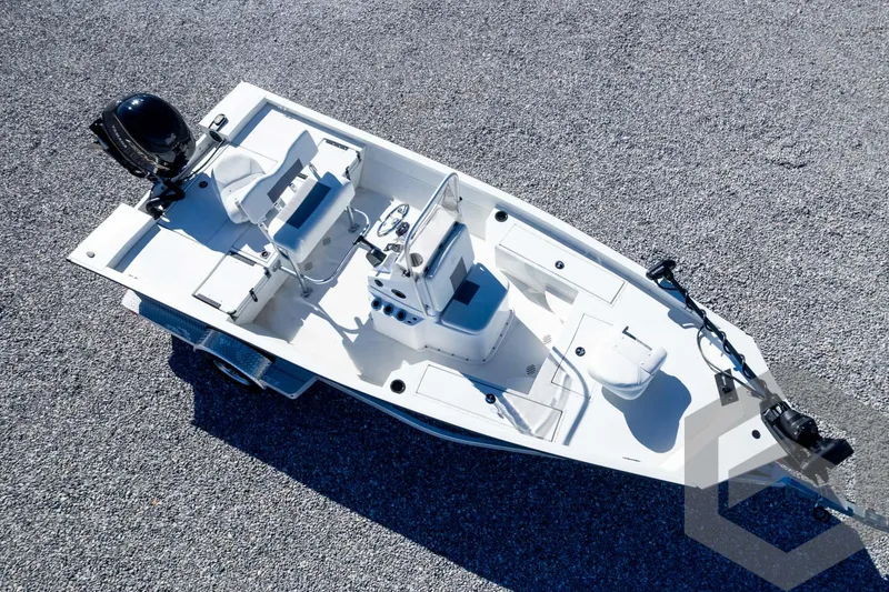 Slide: The Image of 2025 G3 Bay 19 GX boat, aerial view, white deck, modern design. - 34