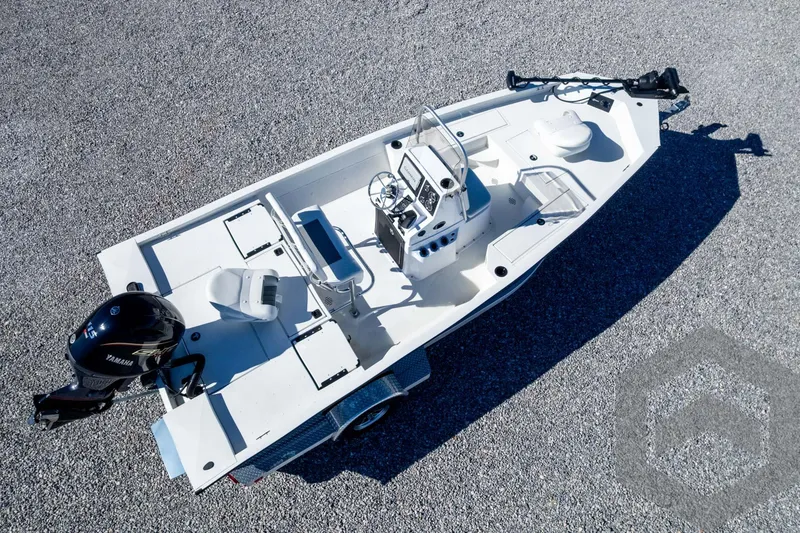 Slide: The Image of 2025 G3 Bay 19 GX boat, aerial view, white hull, Yamaha motor, gravel background. - 36