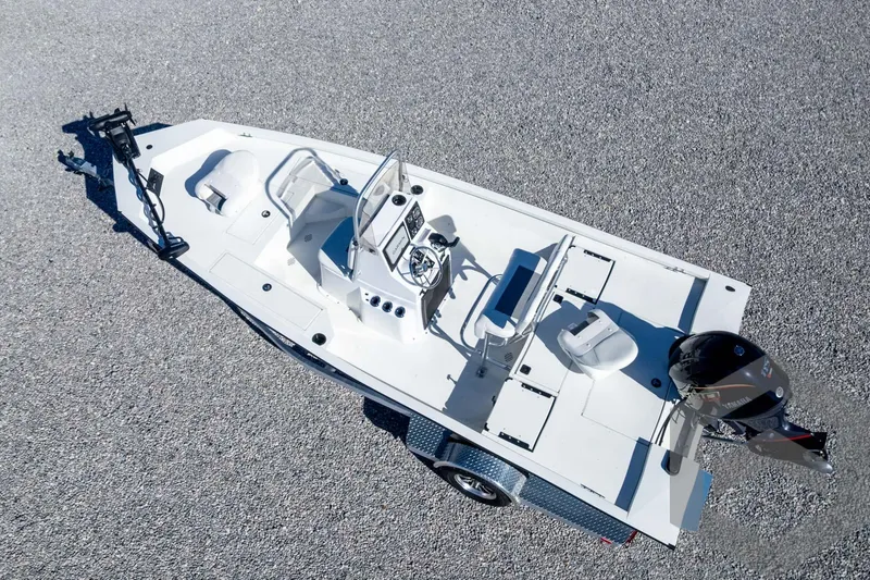 Slide: The Image of 2025 G3 Bay 19 GX boat on trailer, aerial view, white hull, modern design. - 38
