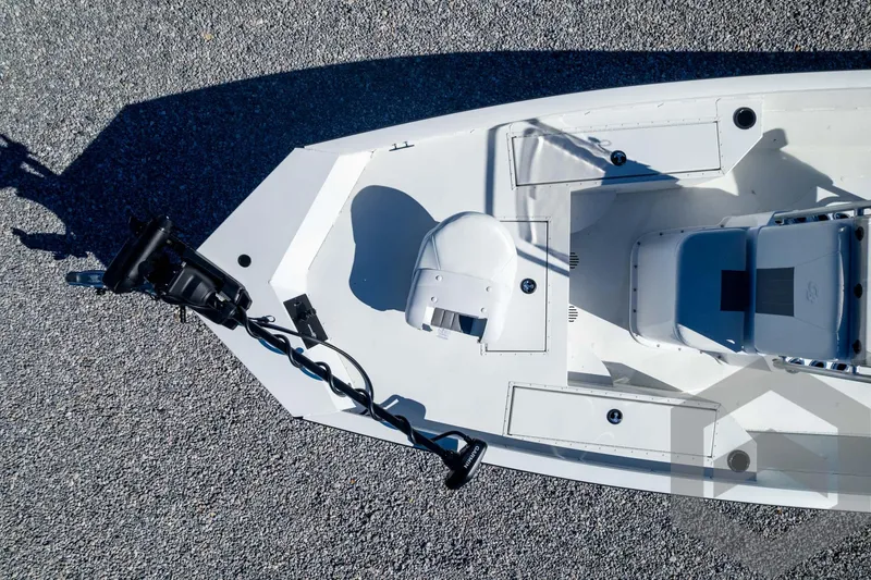 Slide: The Image of 2025 G3 Bay 19 GX boat, aerial view, showcasing deck layout and trolling motor. - 41