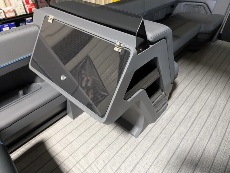 Slide: The Image of Interior of 2025 Manitou Explore Dual Engine, showcasing modern seating and storage design. - 19