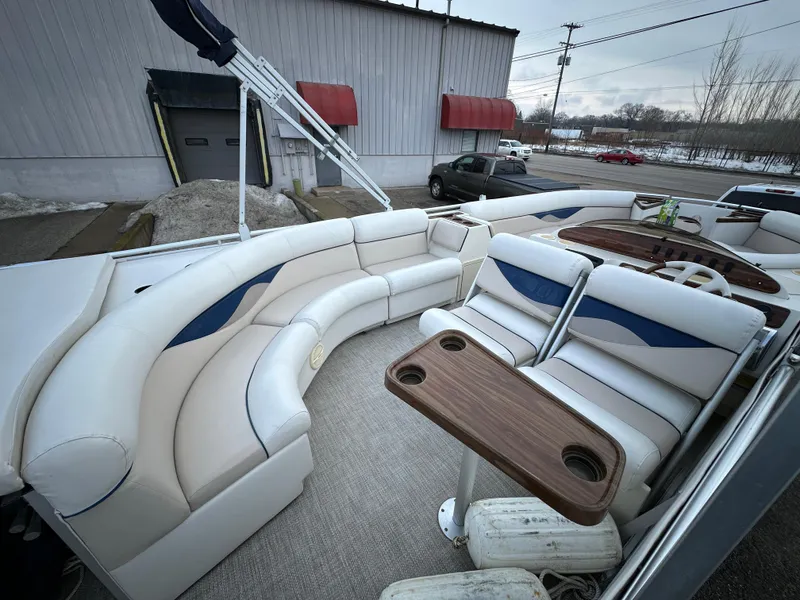 Slide: The Image of 2003 Harris FloteBote 260 Royal Heritage pontoon boat with spacious seating and table. - 16