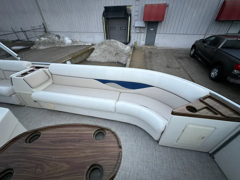 Slide: The Image of 2003 Harris FloteBote 260 Royal Heritage pontoon boat interior with seating and table. - 7