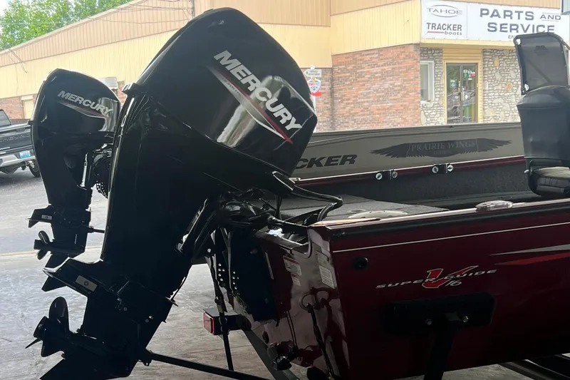 Slide: The Image of 2022 Tracker Super Guide V 16 SC boat with Mercury outboard motor. - 14