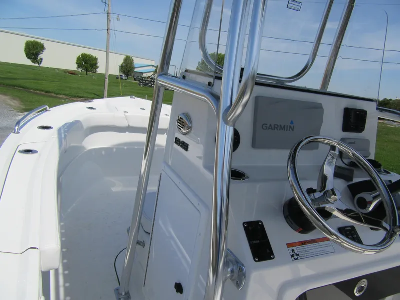 Slide: The Image of 2025 Parker 18SE Center Console boat with Garmin navigation, sleek design, and spacious deck. - 5
