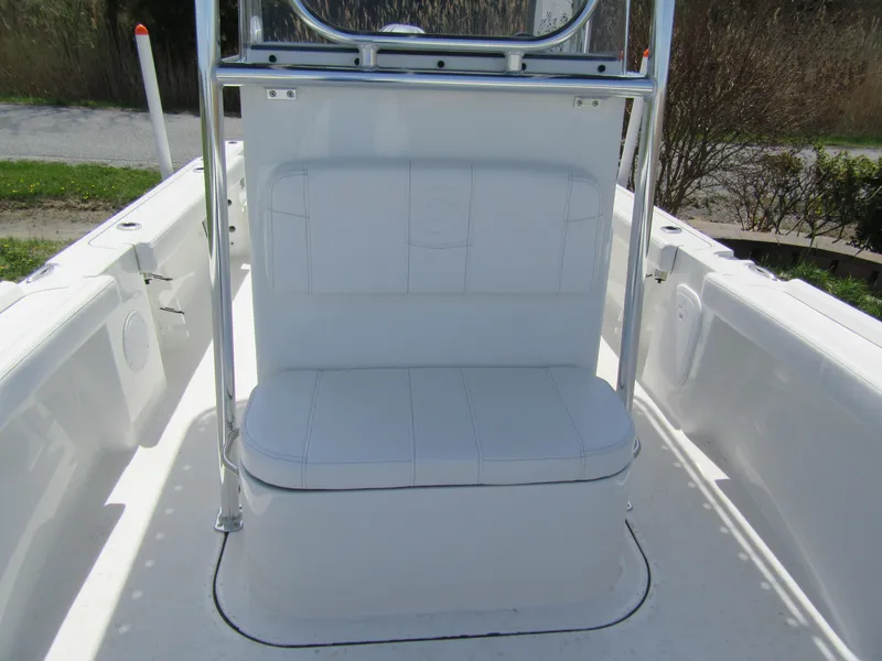 Slide: The Image of 2025 Parker 18SE Center Console boat interior with white seating and sleek design. - 6