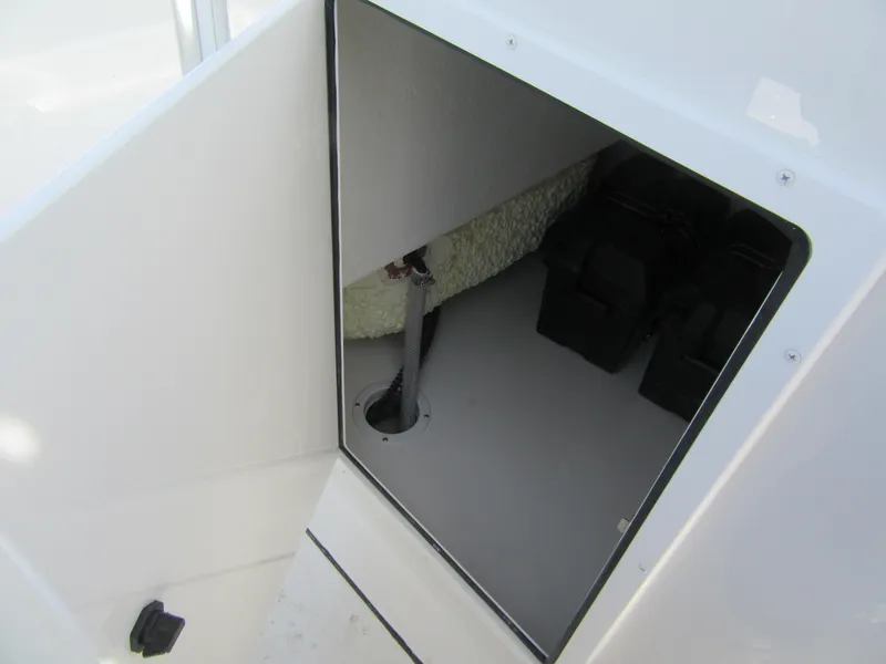 Slide: The Image of Storage compartment in 2025 Parker 18SE Center Console boat. - 9