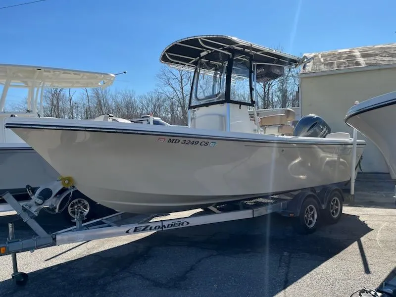 Slide: The Image of 2016 Parker 2100 Special Edition boat on trailer, parked outdoors. - 0