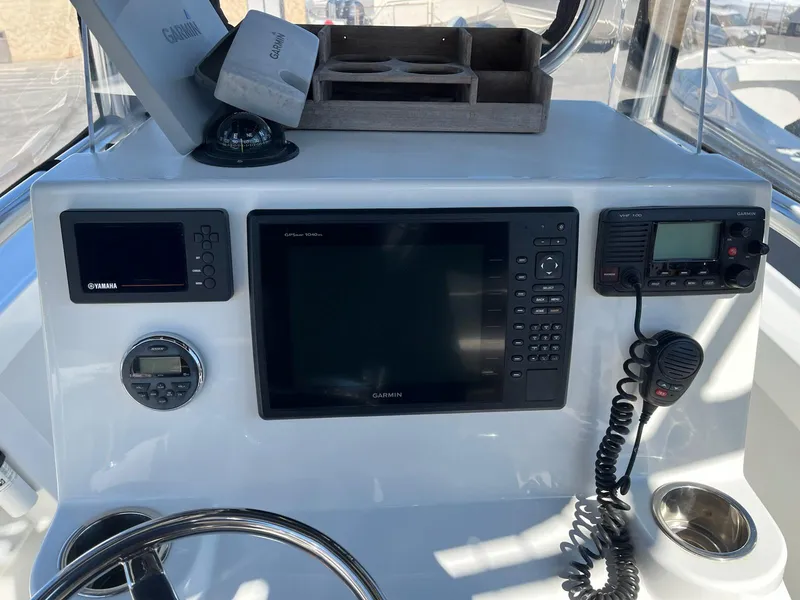 Slide: The Image of Control panel of 2016 Parker 2100 Special Edition boat with navigation equipment. - 4