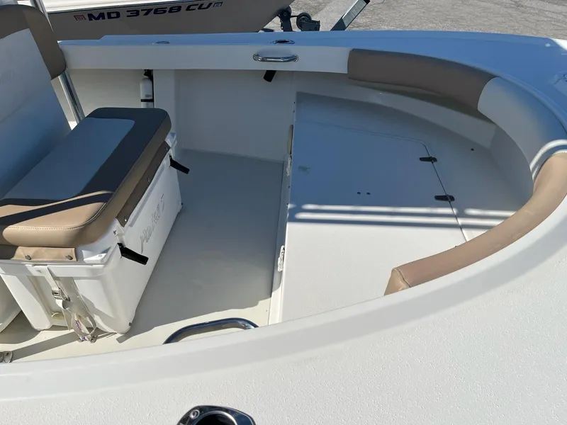 Slide: The Image of 2017 Parker 2100 Special Edition boat interior with seating and storage. - 4