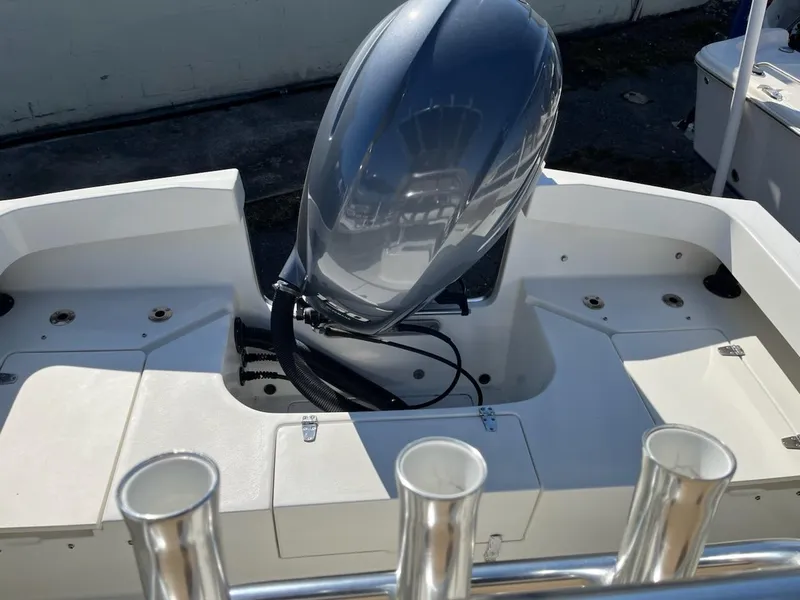 Slide: The Image of 2017 Parker 2100 Special Edition boat with outboard motor, viewed from the rear deck. - 5