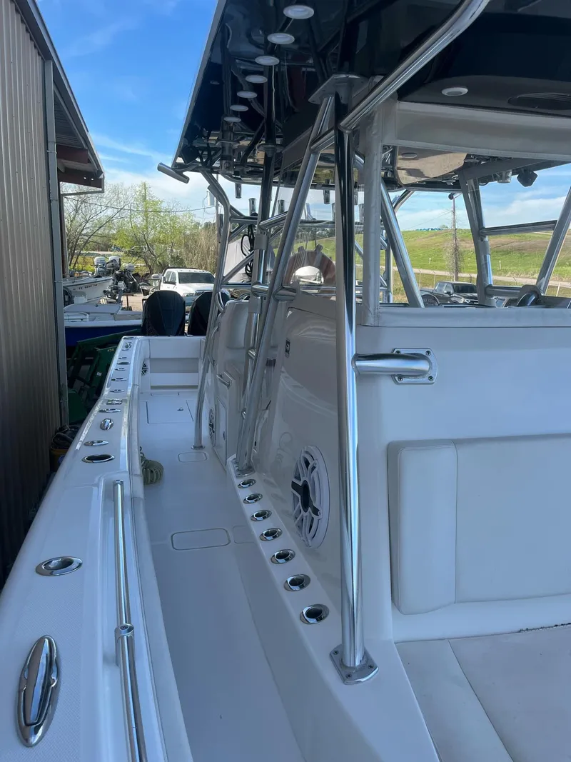 Slide: The Image of 2021 Invincible 39 Open Fisherman boat, sleek design, spacious deck, stainless steel fixtures. - 17