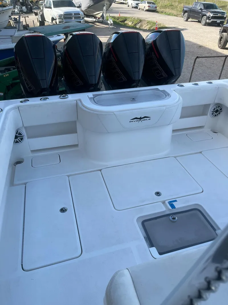 Slide: The Image of 2021 Invincible 39 Open Fisherman boat with four powerful outboard engines. - 6