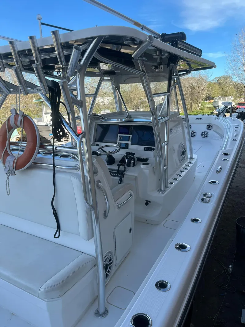 Slide: The Image of 2021 Invincible 39 Open Fisherman boat with modern console and seating. - 7