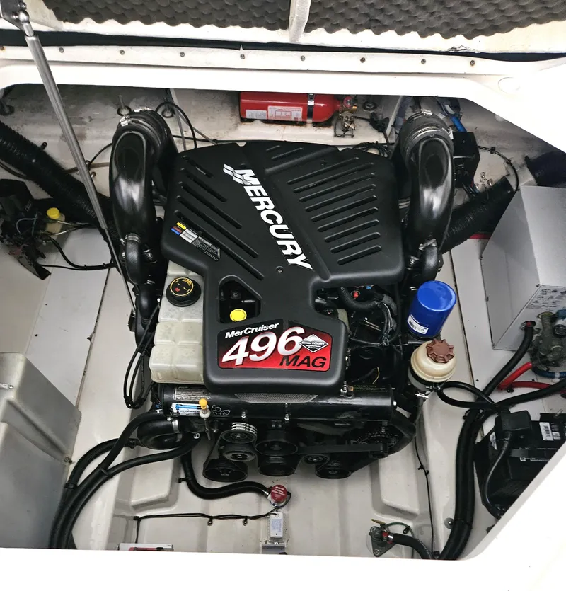 Slide: The Image of Engine compartment of a 2006 Sea Ray 270 Amberjack with MerCruiser 496 MAG engine. - 17