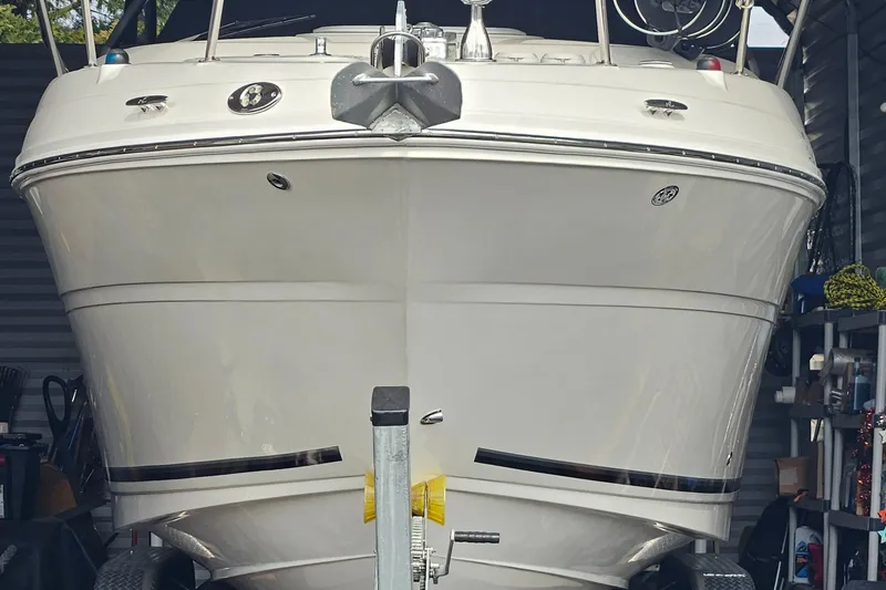 Slide: The Image of 2006 Sea Ray 270 Amberjack boat in storage, front view. - 4