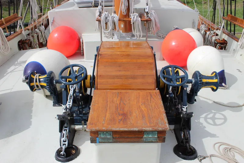 Slide: The Image of Deck of 1988 Custom Lahaina Welding Co. Square Topsail Ketch with winches and buoys. - 11