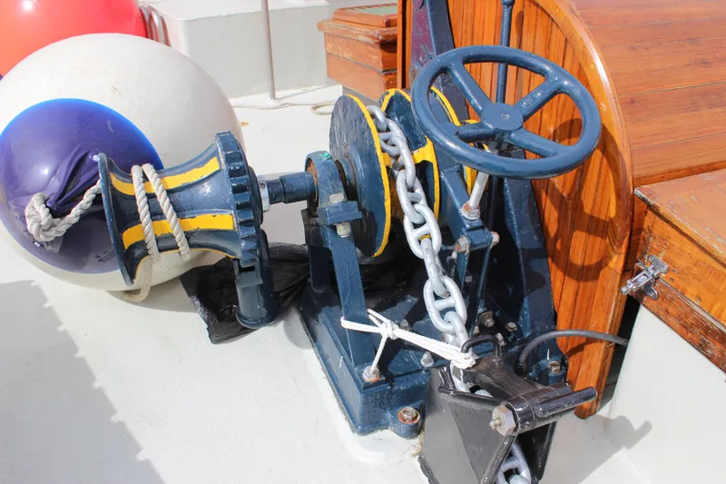 Slide: The Image of Winch and chain mechanism on 1988 Lahaina Welding Co. Square Topsail Ketch deck. - 12