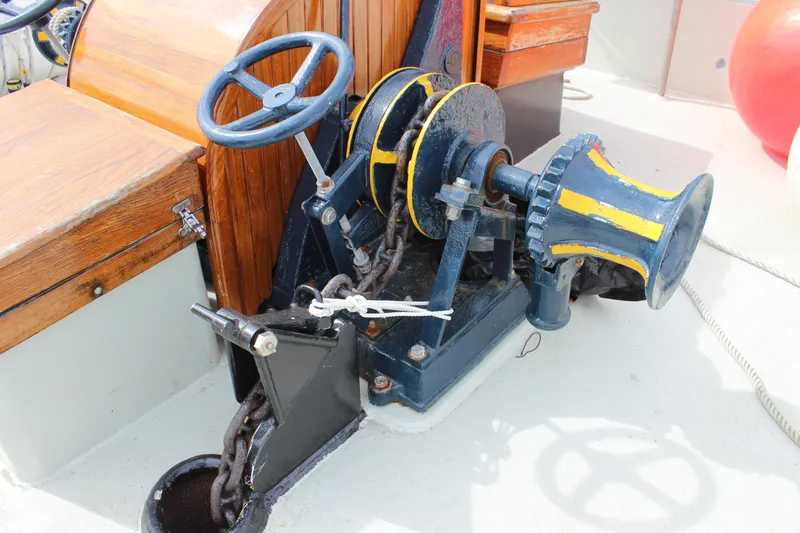 Slide: The Image of Anchor windlass on 1988 Custom Lahaina Welding Co. Square Topsail Ketch deck. - 13