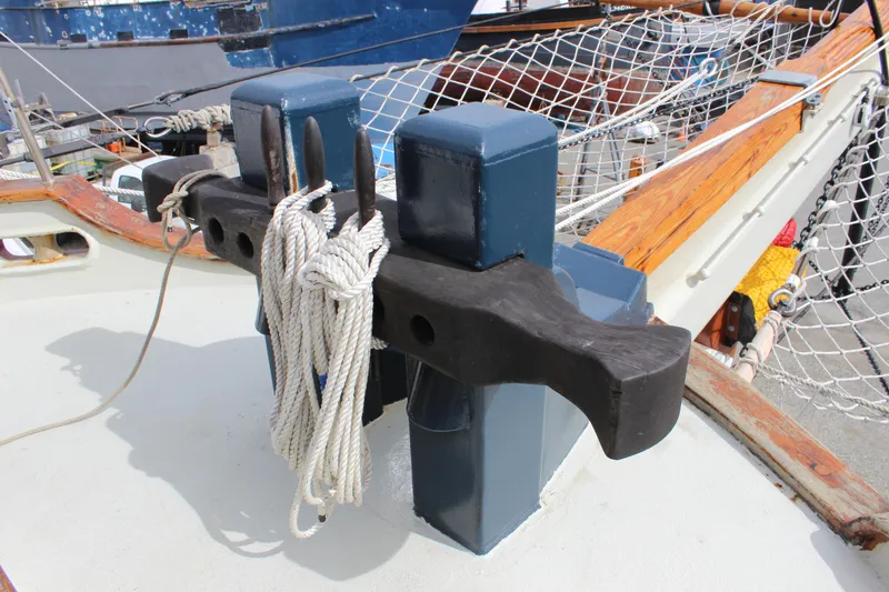 Slide: The Image of Deck detail of 1988 Custom Lahaina Welding Co. Square Topsail Ketch with ropes and netting. - 14