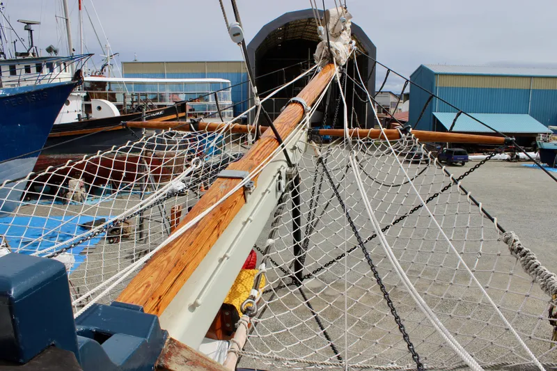 Slide: The Image of Square topsail ketch with wooden mast and rigging at a shipyard, Lahaina Welding Co., 1988 model. - 15