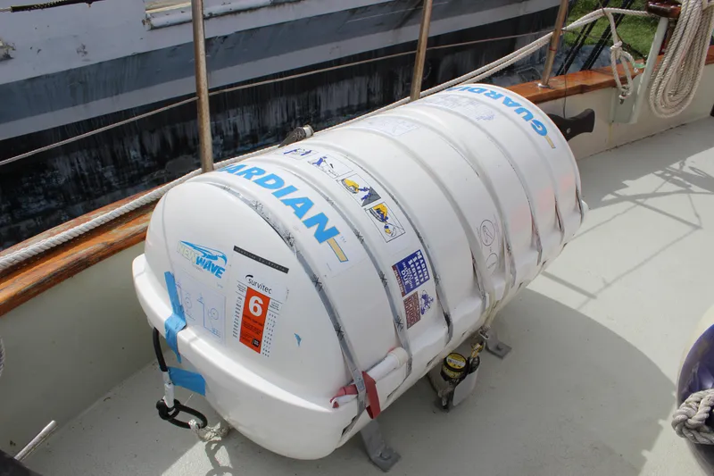 Slide: The Image of Liferaft on deck of 1988 Custom Lahaina Welding Co. Square Topsail Ketch. - 20