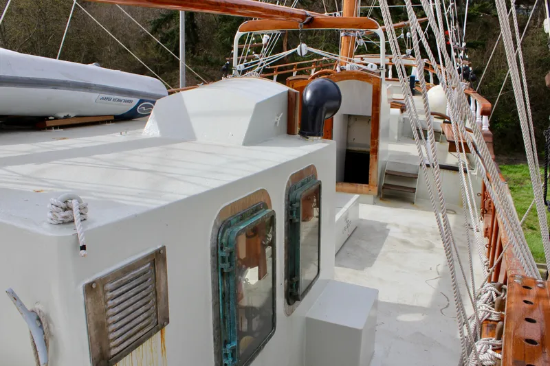 Slide: The Image of 1988 Custom Lahaina Welding Co. Square Topsail Ketch deck with rigging and lifeboat. - 24