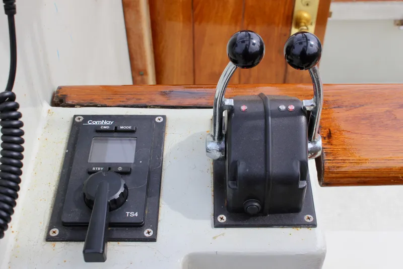 Slide: The Image of Control panel of 1988 Custom Lahaina Welding Co. Square Topsail Ketch with dual throttle levers. - 34